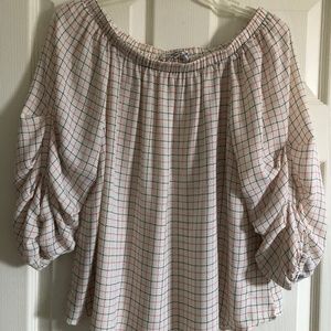 Boutique brand Collective Concepts off the shoulder top